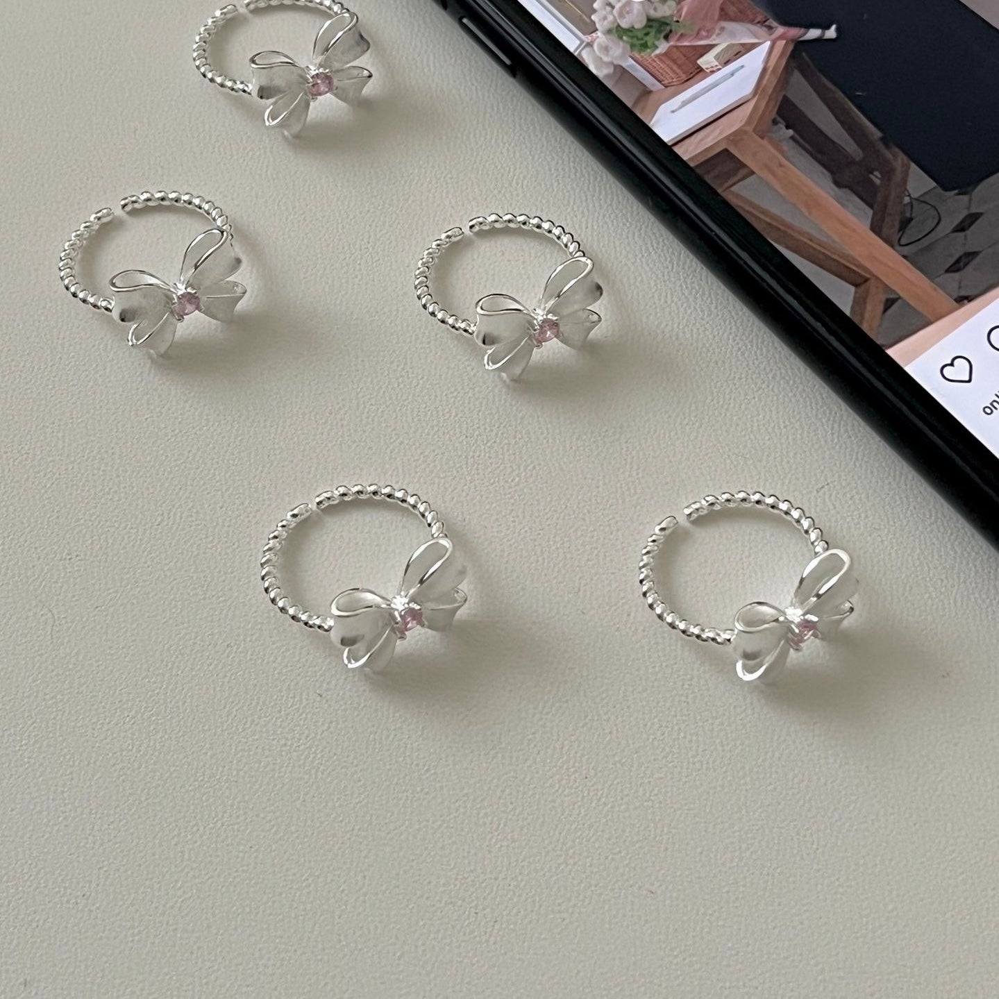 Bow Ring with Pink Zircon