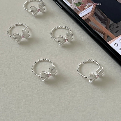 Bow Ring with Pink Zircon