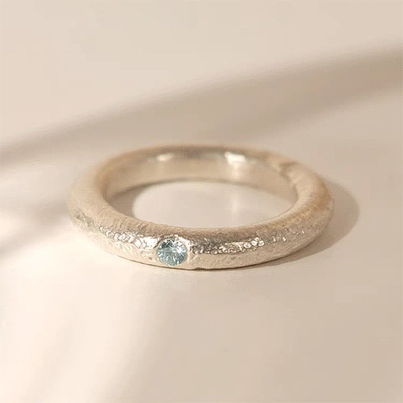 Ice Blue Accent Textured Silver Ring