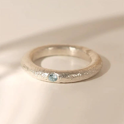 Ice Blue Accent Textured Silver Ring