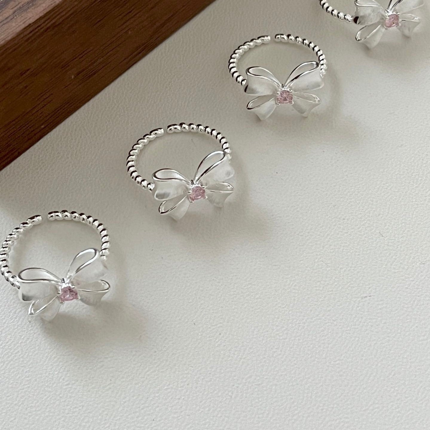 Bow Ring with Pink Zircon