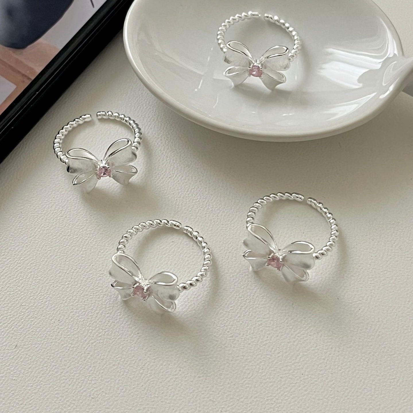 Bow Ring with Pink Zircon